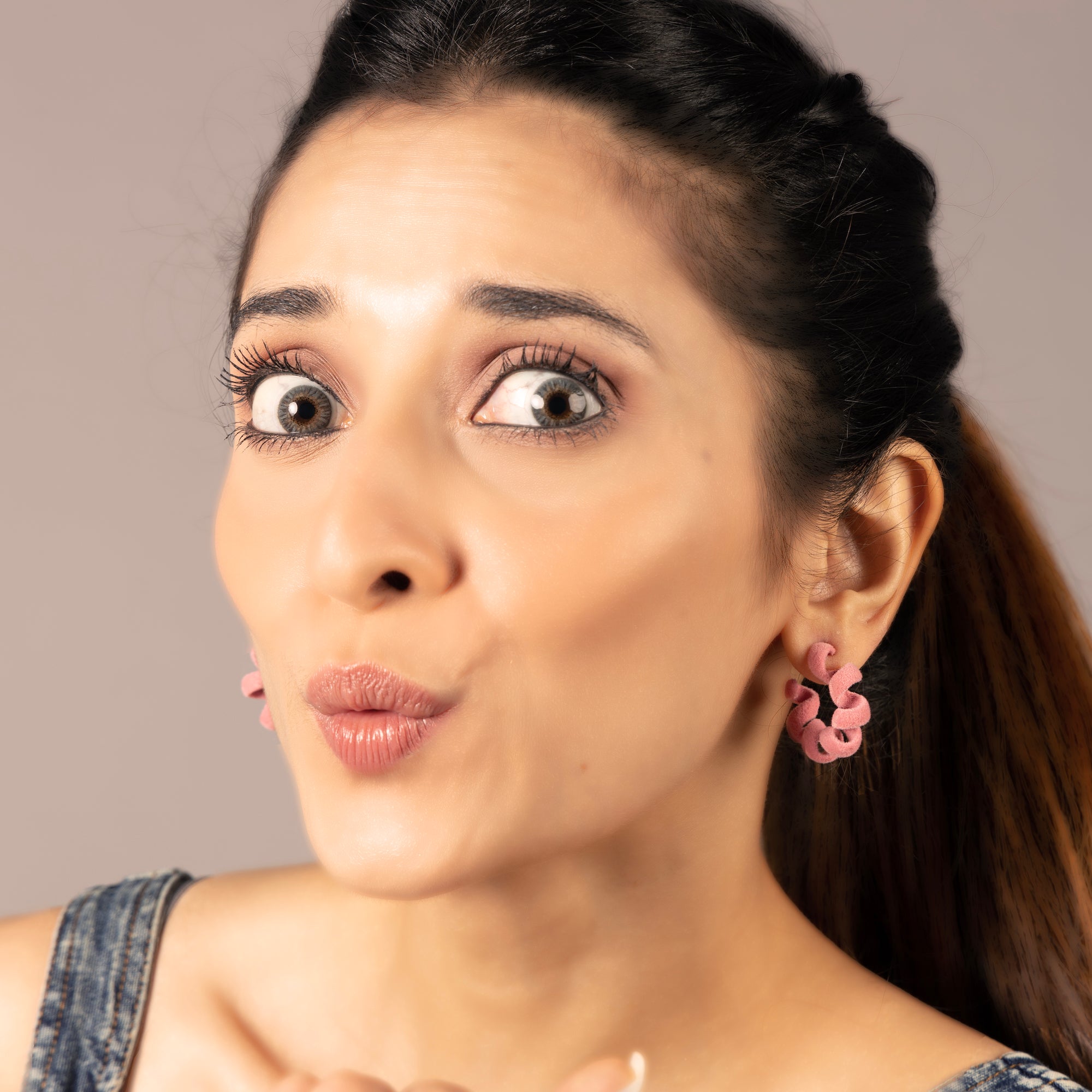 Flamingo pink curly hoops