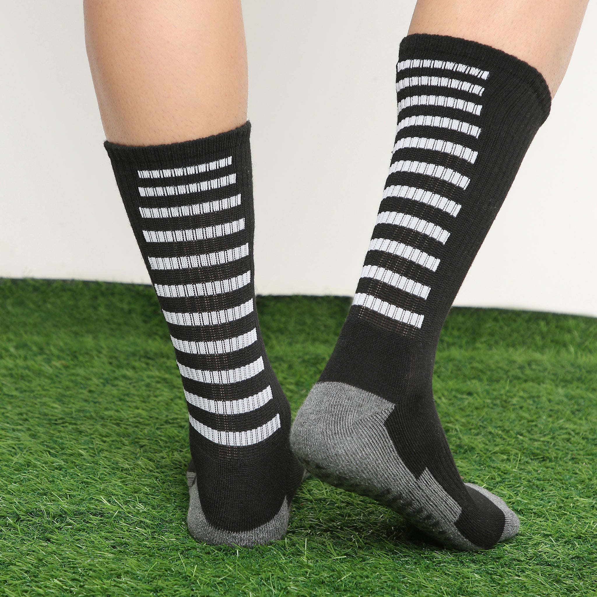 Men’s Crew Length Performance Grip Socks – Black with white strips