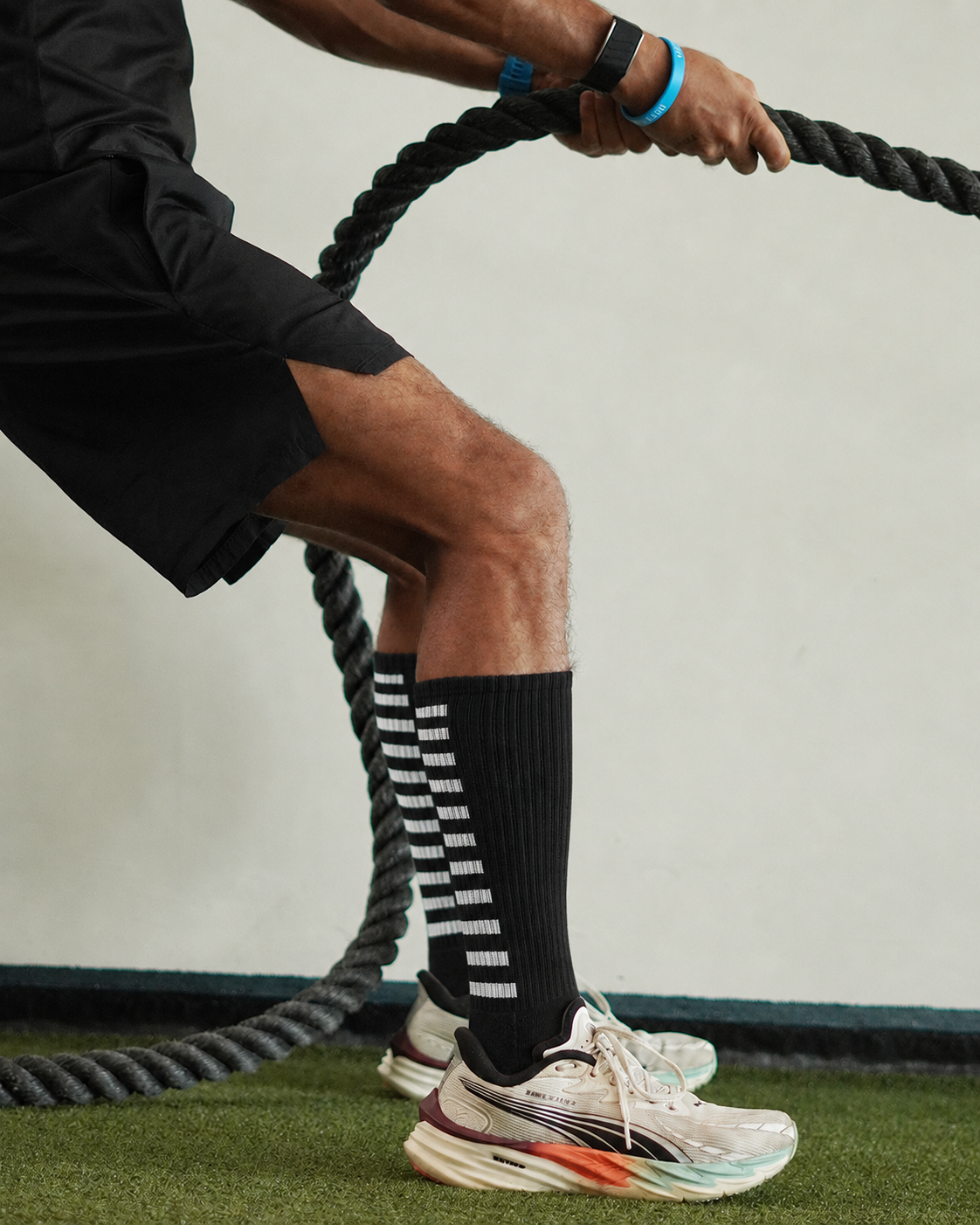 Men’s Crew Length Performance Grip Socks – Black with white strips
