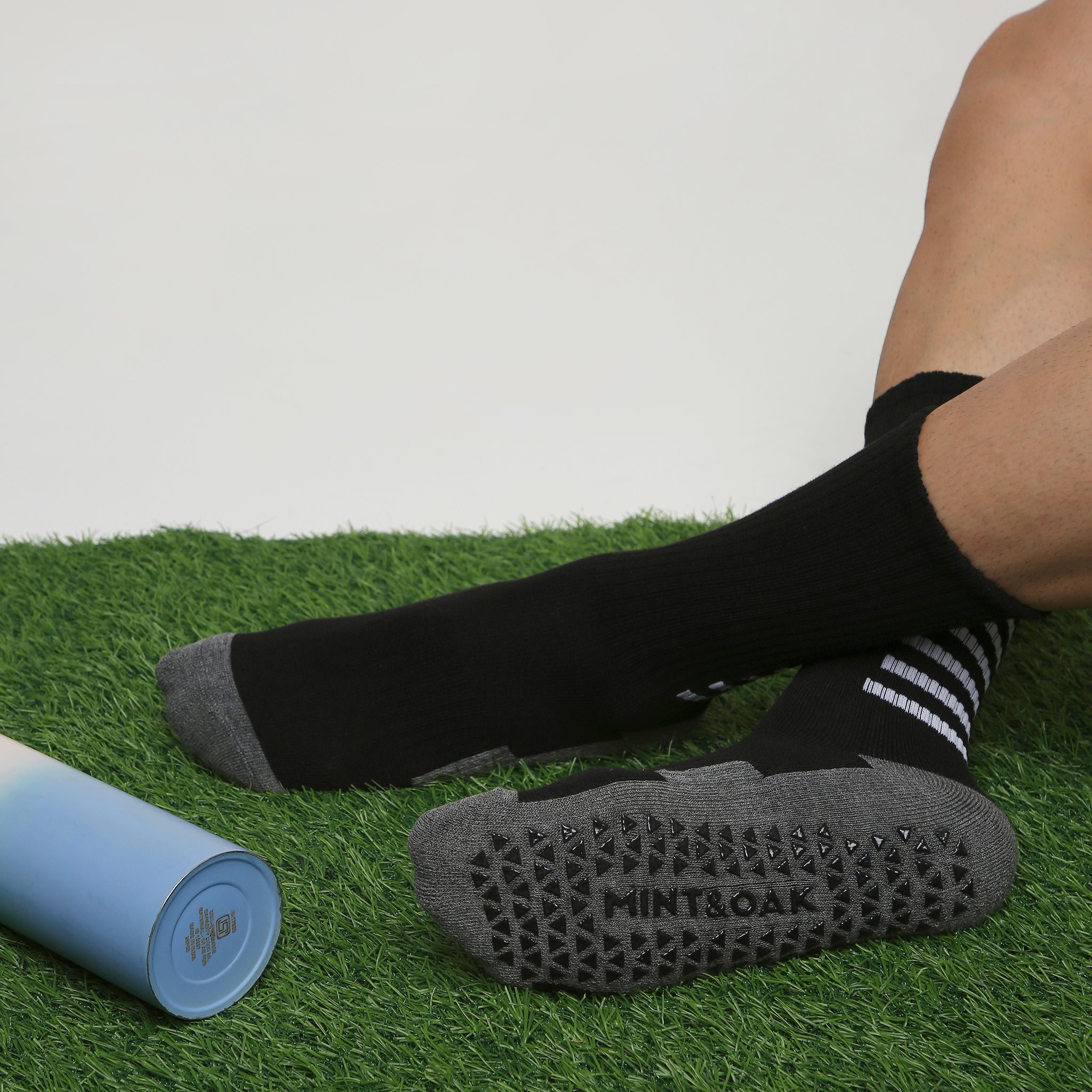 Men’s Crew Length Performance Grip Socks – Black with white strips