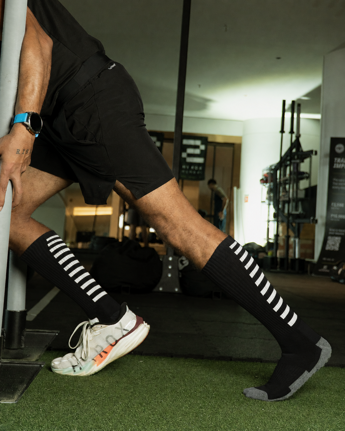 Men’s Crew Length Performance Grip Socks – Black with white strips