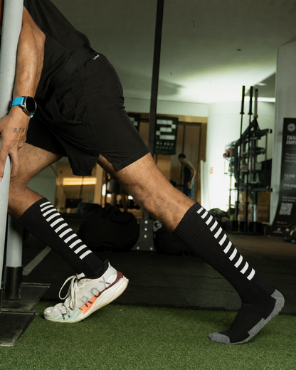 Men’s Crew Length Performance Grip Socks – Black with white strips
